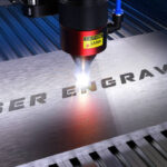 Metal machining with sparks on CNC laser engraving maching. 3D rendering